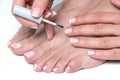 Woman hands and feet with french manicure Royalty Free Stock Photo