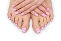 Woman hands and feet with french manicure Royalty Free Stock Photo