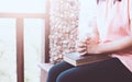 Woman hands folded in prayer on a Holy Bible Royalty Free Stock Photo