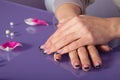 Woman hands with french manicure with crystals Royalty Free Stock Photo