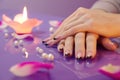 Woman hands with french manicure with crystals Royalty Free Stock Photo