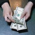 Woman hands hold and counting dollar banknotes Royalty Free Stock Photo