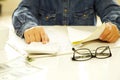 Woman hands holding bills and calculator Royalty Free Stock Photo