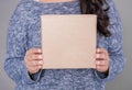 Woman holding blank carton box. Mockup for design Royalty Free Stock Photo