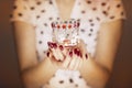 Woman hands holding a candle light Royalty Free Stock Photo