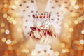 Woman hands holding a candle light Royalty Free Stock Photo