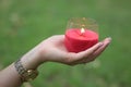 Woman hands holding a candle, sign of hope concept Royalty Free Stock Photo