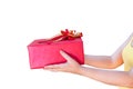 Woman hands holding christmas holiday gift red box on decorated festive on isolated on white background Royalty Free Stock Photo