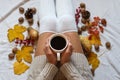 Cozy Autumn Mornings: Savoring Coffee in a Bed of Tranquility