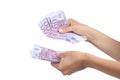 Woman hands holding and counting a lot of five hundred euros banknotes