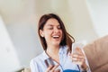 Woman hands holding a credit card and using smart phone for online shopping Royalty Free Stock Photo