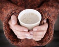 Woman hands holding a hot drink Royalty Free Stock Photo