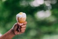 Woman hands holding ice cream cone