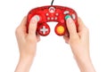 Woman hands holding Mario GameCube Controller