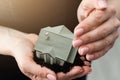 woman hands holding paper house, model Royalty Free Stock Photo