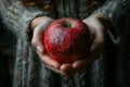 Woman Hands Holding Red Apple. AI Generated