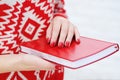 Woman hands holding red diary Royalty Free Stock Photo