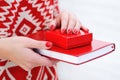 Woman hands holding red diary Royalty Free Stock Photo