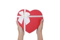 Woman hands holding red heart gift box for Valentine festive isolated on white background