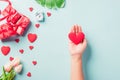 Woman hands holding red heart and have gift or present box decorated surprise Royalty Free Stock Photo