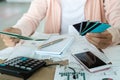 Woman holding saving account passbook and credit cards , account and saving concept Royalty Free Stock Photo