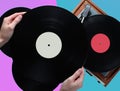 Woman hands holding vinyl record, vinyl player Royalty Free Stock Photo