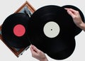 Woman hands holding vinyl record, vinyl player Royalty Free Stock Photo