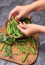 Woman hands hulled peas Royalty Free Stock Photo