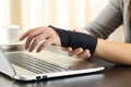 Woman hands with injured wrist complaining