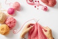 Woman hands knitting with needles and yarn