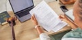 Woman, hands and lawyer reading will or documents for court judge or justice on office desk above. Notary person or Royalty Free Stock Photo