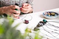 Woman hands making handmade gemstone jewellery Royalty Free Stock Photo