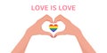 Woman hands making heart shape gesture with lgbt rainbow in flat style. Web banner with phrase Love is Love. Celebrating Royalty Free Stock Photo