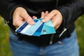 Woman hands with many different credit cards outdoors Royalty Free Stock Photo