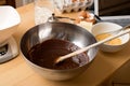 Woman hands mixing melted chocolate Royalty Free Stock Photo