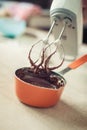 Woman hands mixing melted chocolate in the kitchen Royalty Free Stock Photo