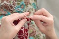 Woman hands needle knitting