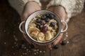 Woman hands offering a healthy snack, porridge Royalty Free Stock Photo