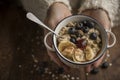 Woman hands offering a vegan brunch, porridge Royalty Free Stock Photo