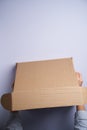 Woman hands open empty cardboard box, top view Royalty Free Stock Photo