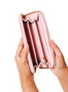 Woman hands opening an empty pink purse.