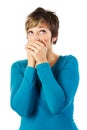 Woman with hands over her mouth Royalty Free Stock Photo