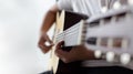 Woman hands playing acoustic classic guitar the musician of jazz and easy listening style select focus shallow depth of field with Royalty Free Stock Photo