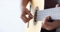 Woman hands playing acoustic classic guitar the musician of jazz and easy listening style select focus shallow depth of field with Royalty Free Stock Photo