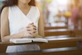 Woman hands praying on a holy bible in church for faith concept, Spirituality and Christian religion Royalty Free Stock Photo