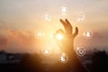 Woman hands praying and religions icon on sunset background