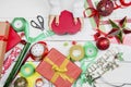 Woman hands prepare to decorate a Christmas gift Royalty Free Stock Photo