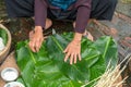 Woman hands preparing to make Chung Cake, the Vietnamese lunar new year Tet food