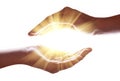 Woman hands protecting and containing bright, glowing, radiant, shining light. Emitting rays or beams expanding of center.