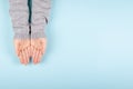 Woman hands in pullover gesture, flat lay Royalty Free Stock Photo